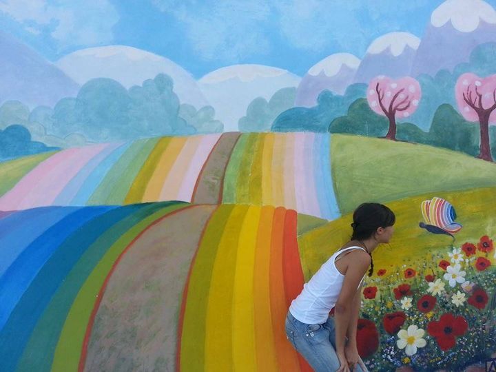 Il contesto del progetto La fattoria sociale di Azione X Organizzazione di volontariato di Trapani e il murales con la farfalla